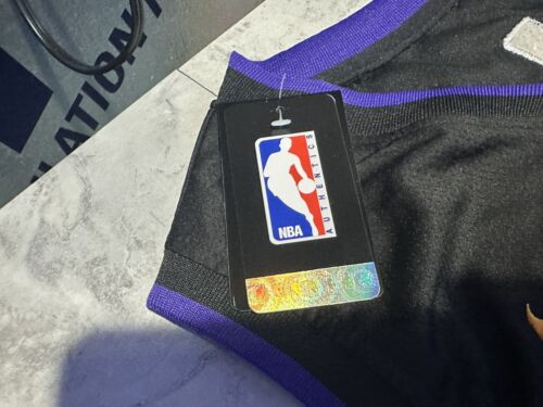 NWT Kobe Bryant No# 24 jersey Black/ Purple Stitched. Size 50.