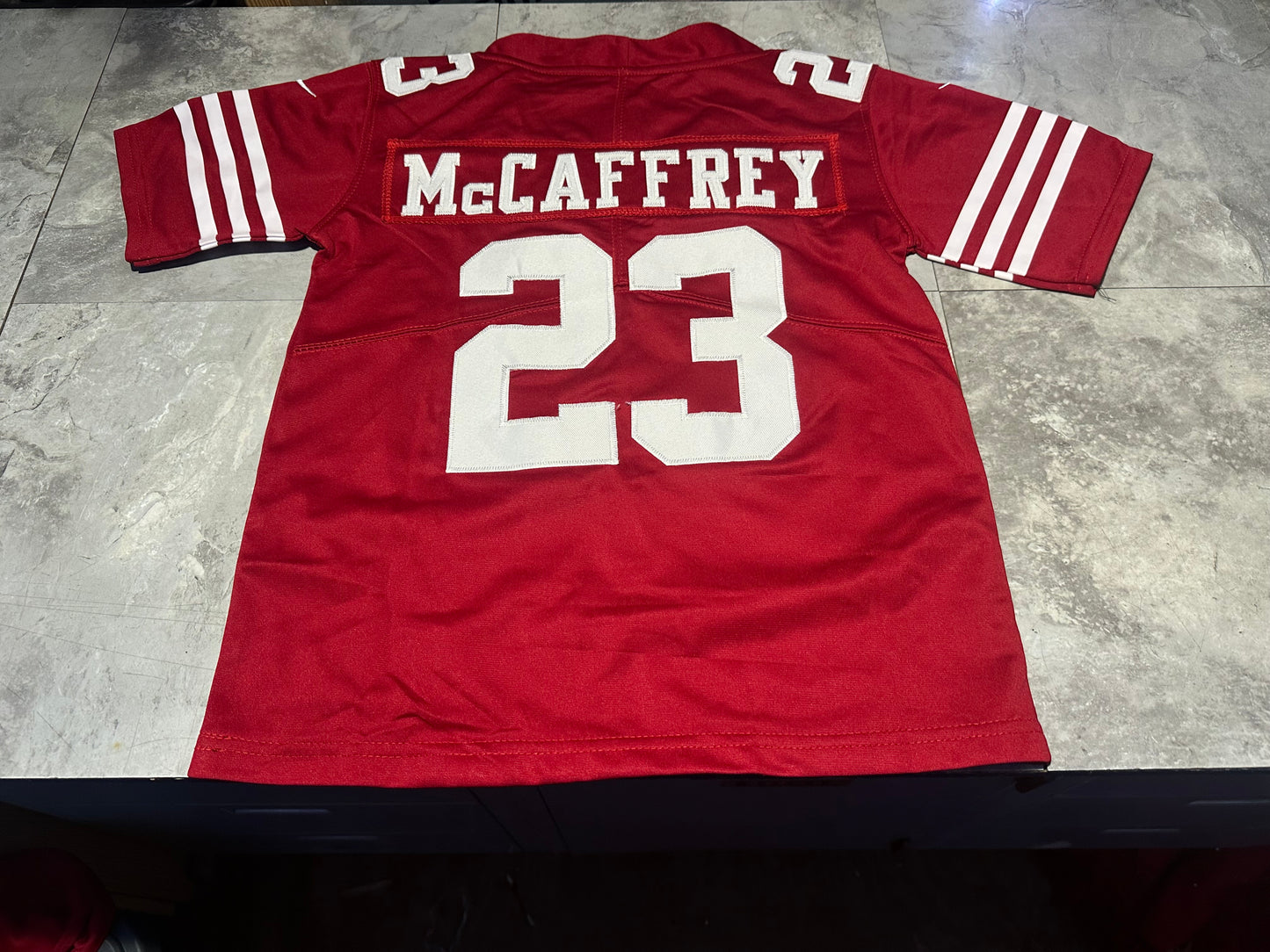 NWT Youth Christian McCaffrey # 23 San Francisco 49ers jersey Large